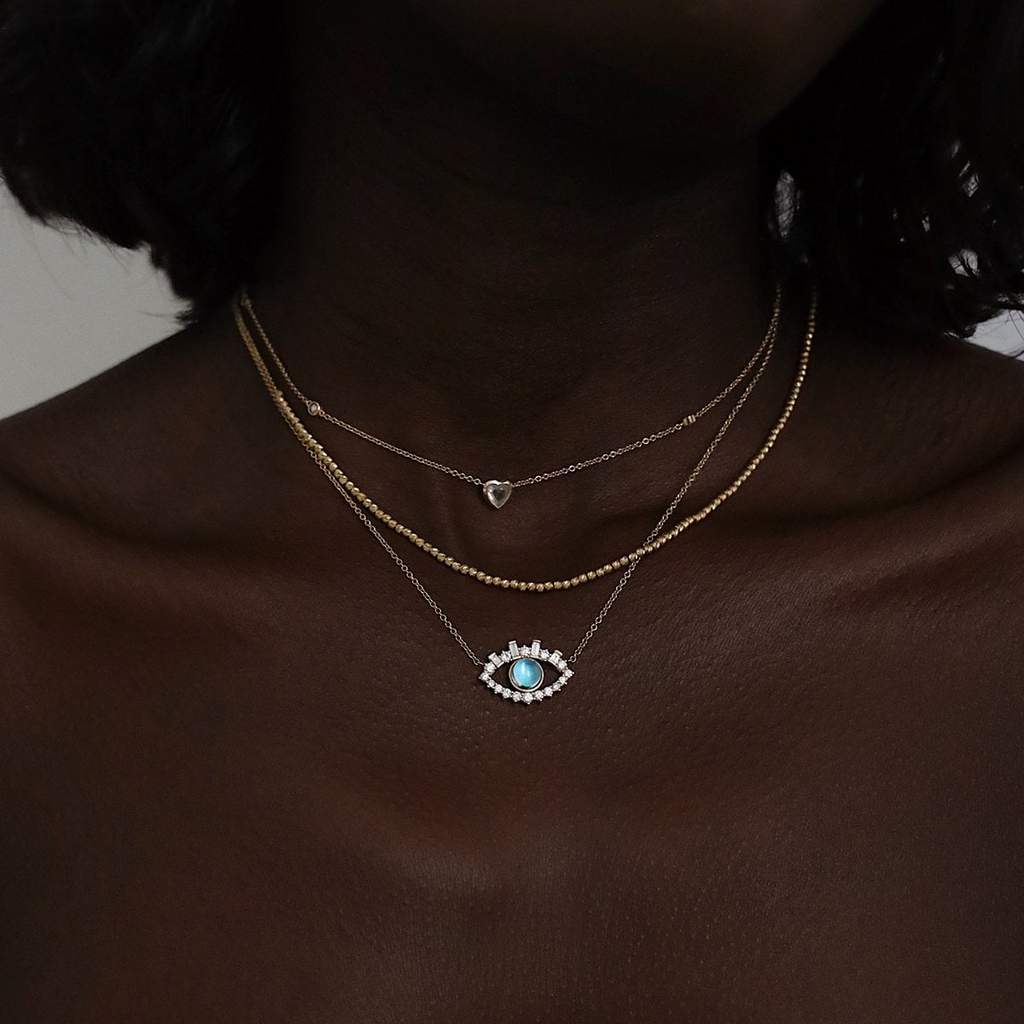 Leah || Evil eye blue sheen moonstone and baguette diamond necklace